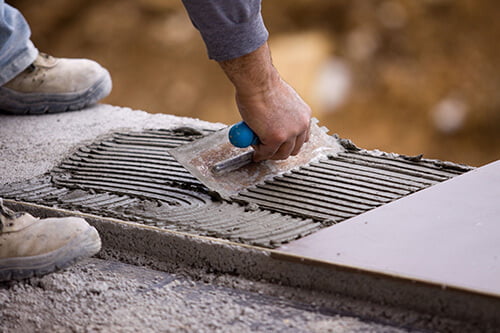 laying tiles - LSK Building Westbury, Warminster and Trowbridge