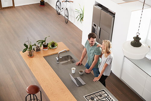 man and woman in a kitchen - LSK Building Westbury, Warminster and Trowbridge