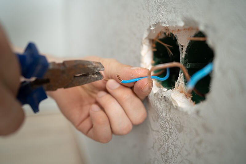 fitting wiring into a wall - LSK Building Westbury, Warminster and Trowbridge