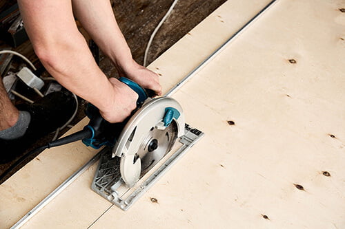 sawing wood - LSK Building Westbury, Warminster and Trowbridge
